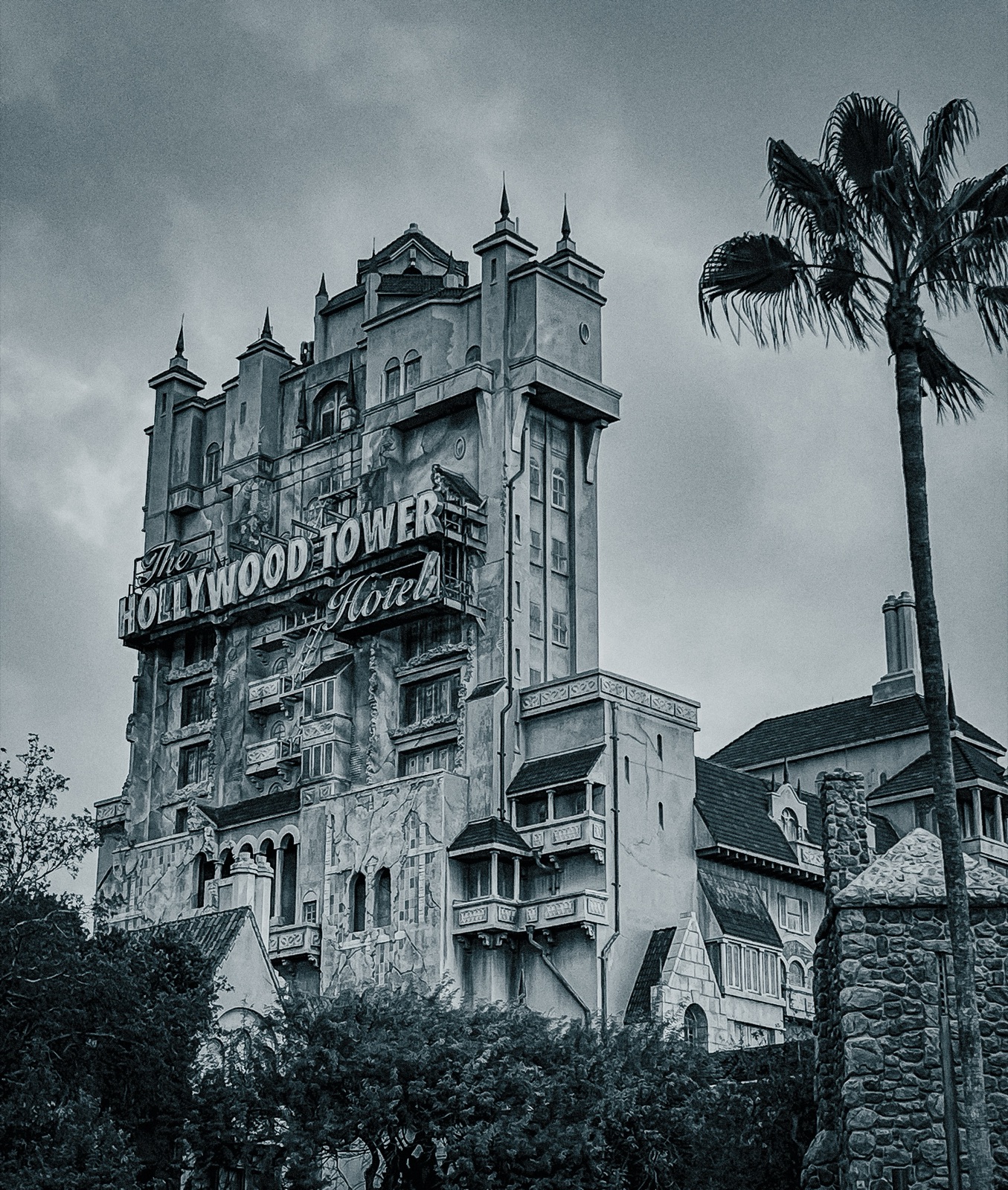 The Hollywood Tower Hotel against a stormy sky
